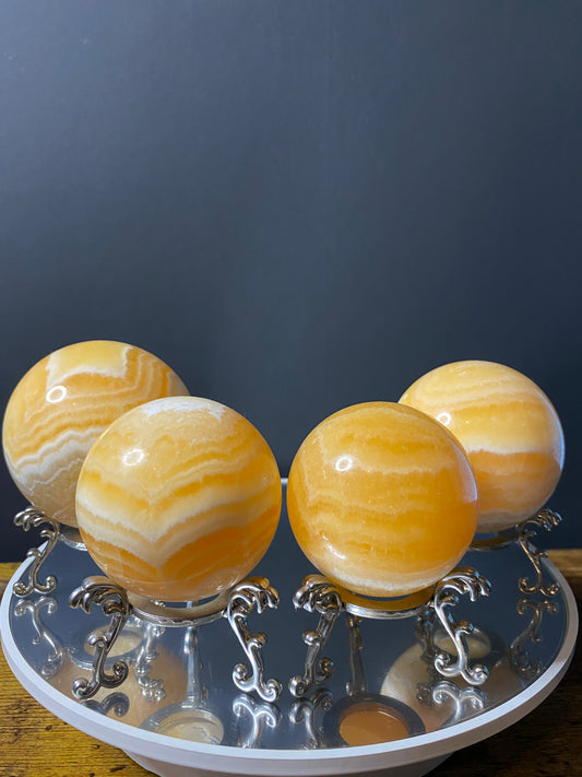 ORANGE CALCITE SPHERES E - H